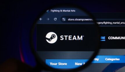 Asset id: 2631578251 Steam website on the Screen enlarged with a magnifying glass. Indonesia - May 22, 2025 See less